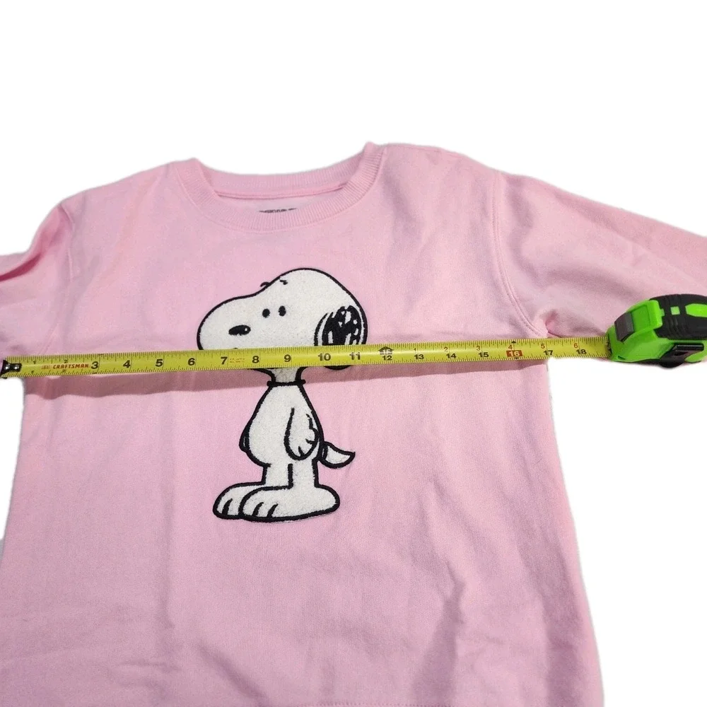 Brand New Peanuts Pink Snoopy Sweater.  Size XL Juniors